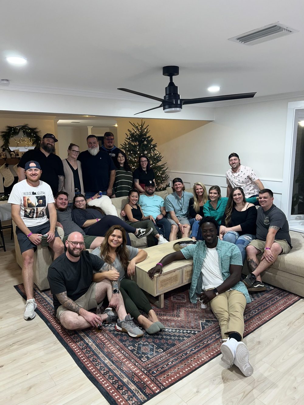 HouseScan team gathered together in a living room for a group photo